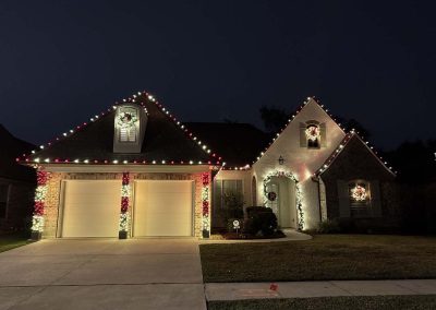 Brick Home Candycane Garage Wreaths
